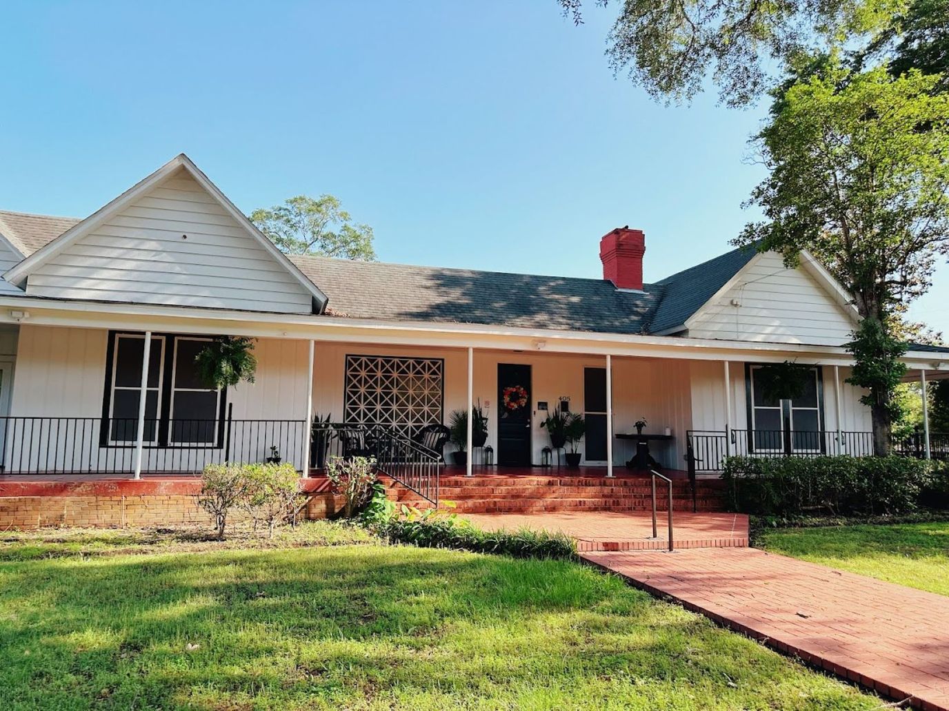 Front exterior of a charming assisted living facility