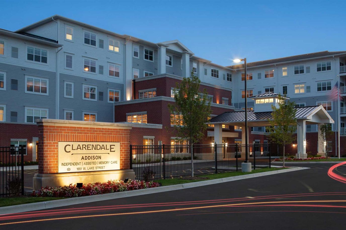 Exterior view of Clarendale of Addison at twilight