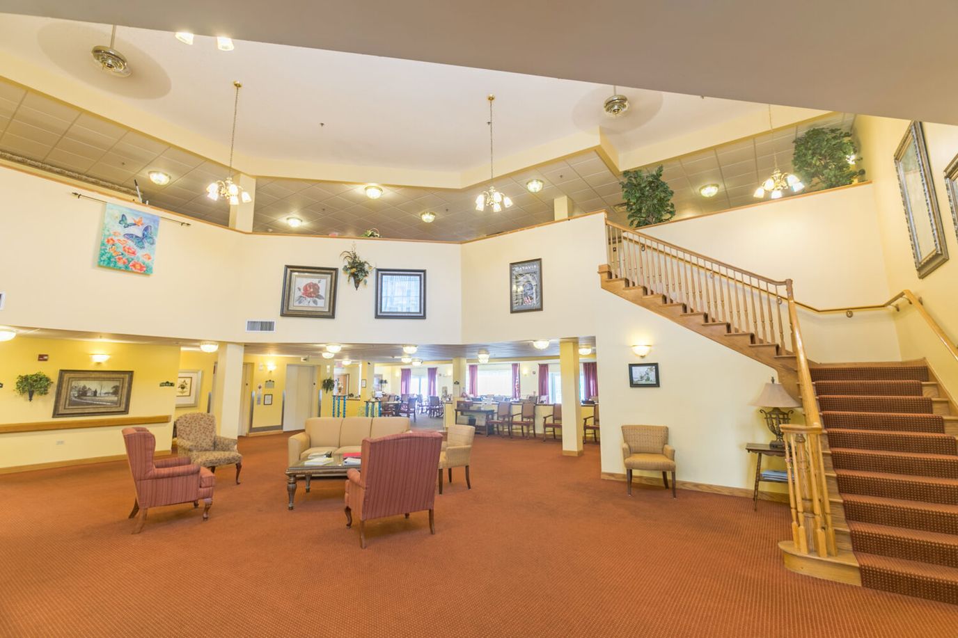 Bright interior common area with seating and stairs
