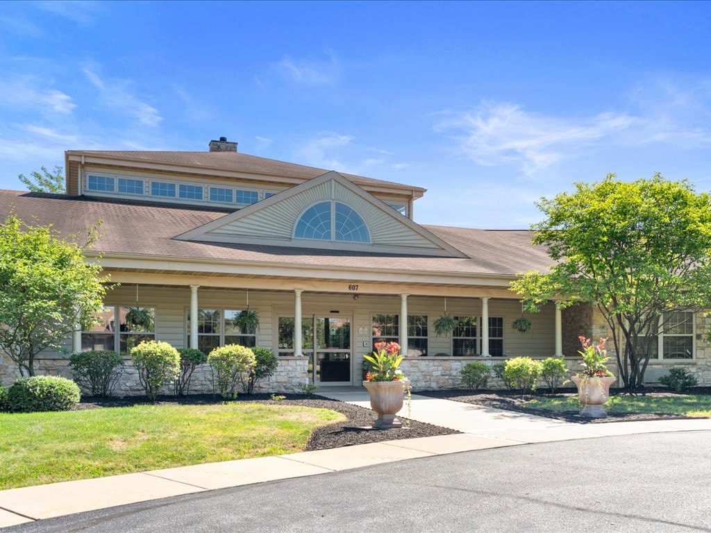 Exterior view of Juniper Village at Mount Joy showing landscaping and entrance