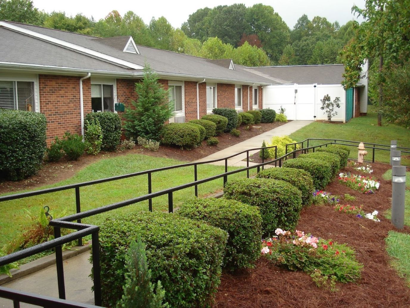 Exterior view of Magnolia Creek with landscaped gardens
