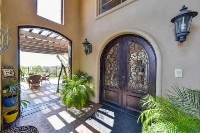 Entrance of a senior care facility with outdoor seating