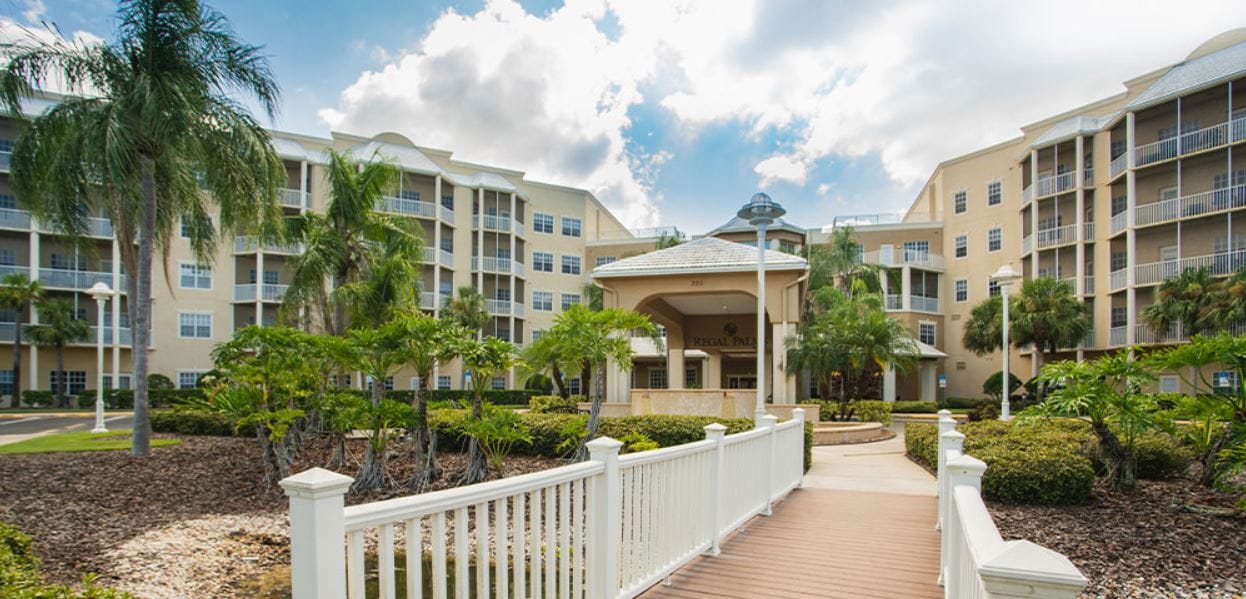 Exterior view of Regal Palms nursing home entrance