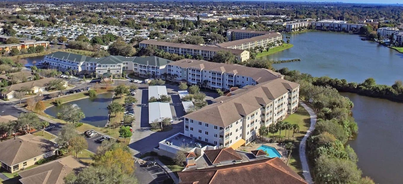 Aerial view of the Water's Edge of Bradenton facility with lakes and buildings