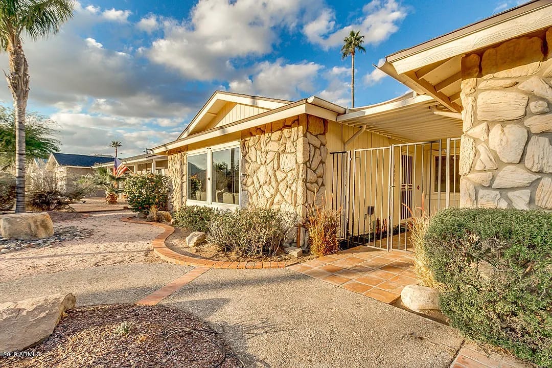 Exterior view of Aegis at Coconino with landscaping