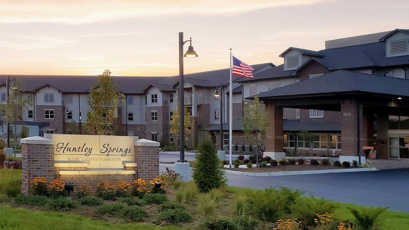 Exterior view of Huntley Springs Retirement Resort at sunset