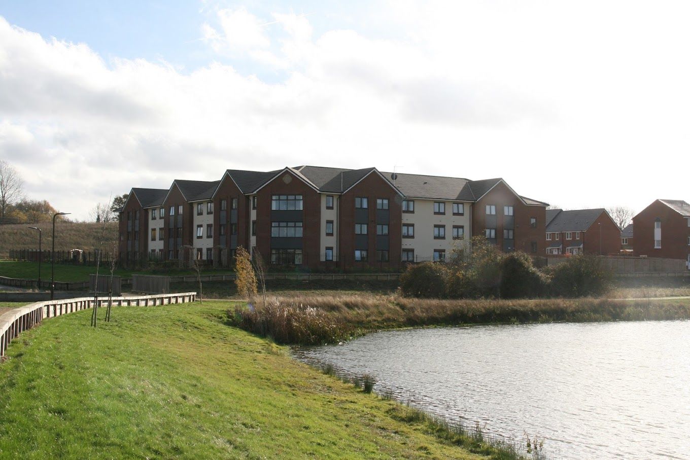Exterior view of Lakeview Lodge Care Home by the water