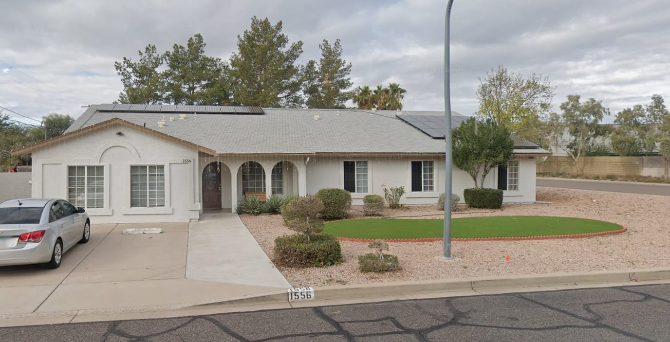 Exterior view of a senior care facility with landscaping