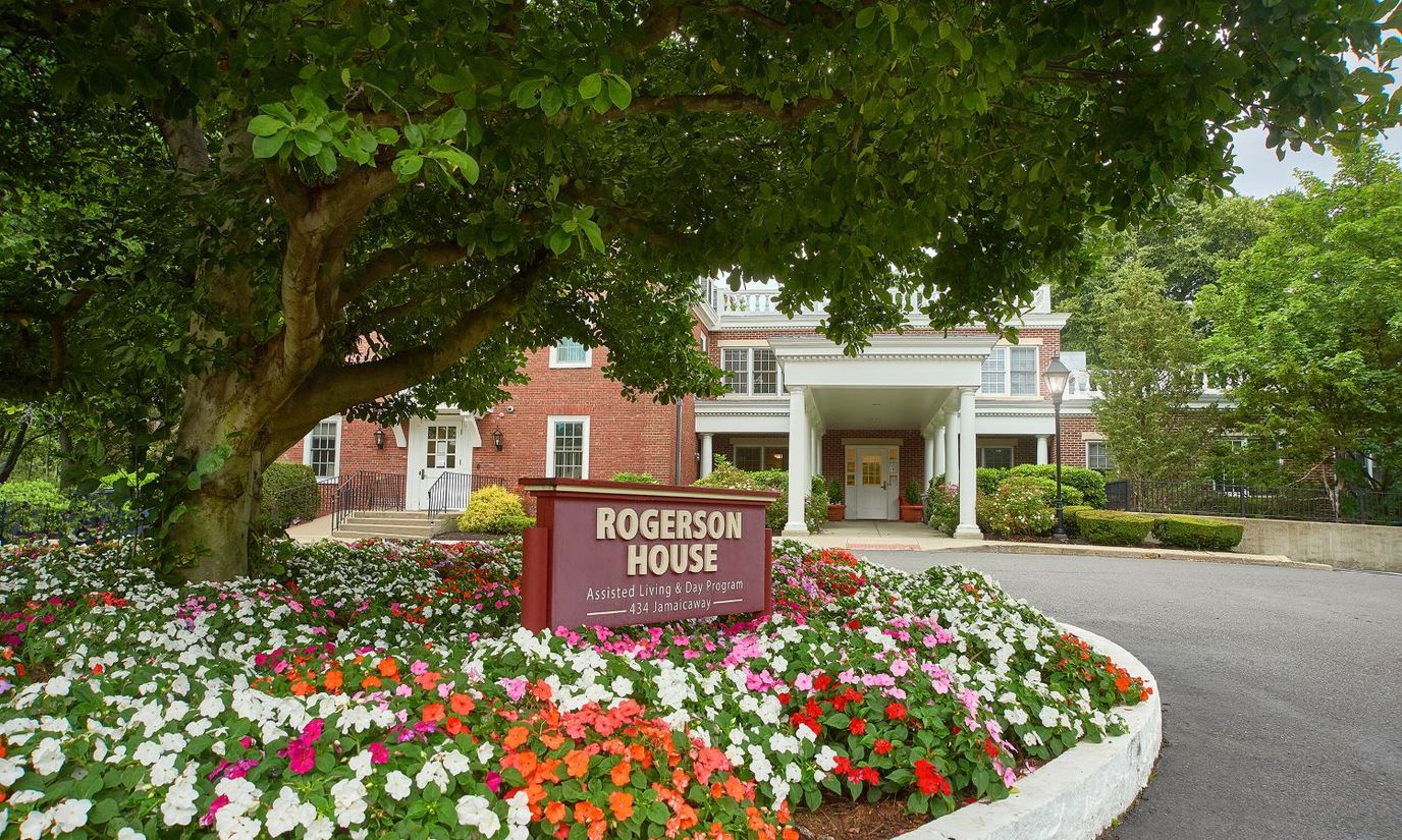 Entrance of Rogerson House with floral landscaping