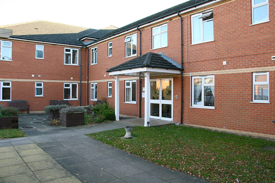 Exterior view of Swanholme Court Care Home building