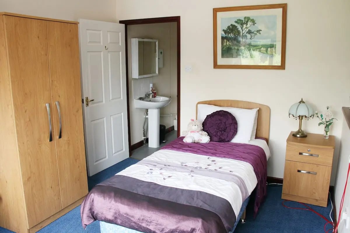 Cozy private room with a bed and decor
