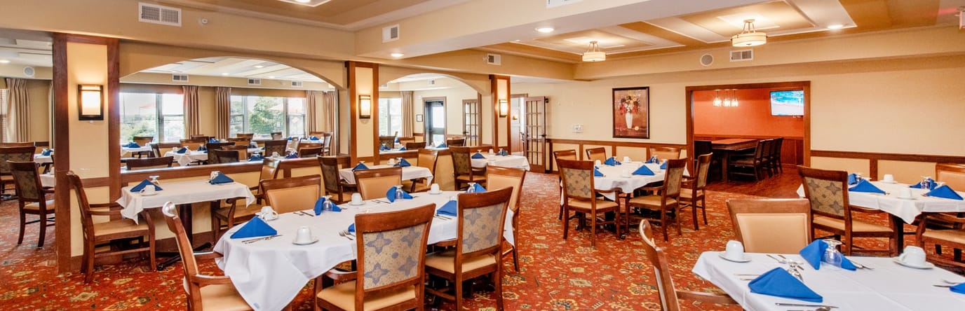 Dining room with neatly arranged tables and chairs