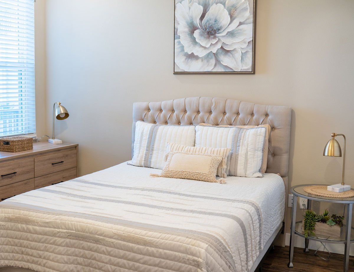 Cozy interior bedroom with a floral painting