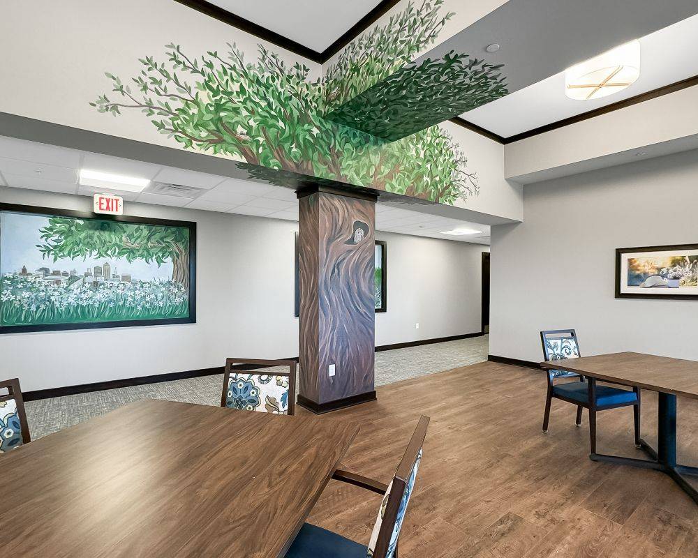 Interior view of a common area with mural decorations