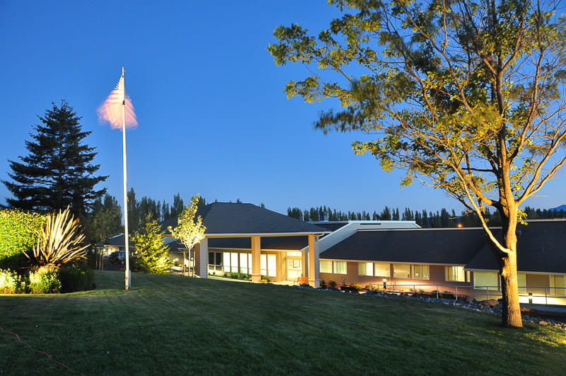 Exterior view of Life Care Center of Port Townsend at dusk
