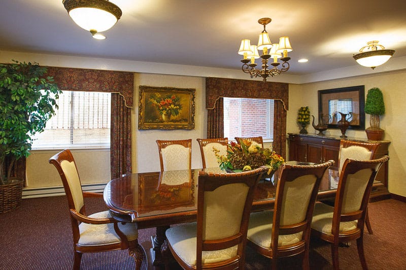 Elegant dining room with a large table and chandelier