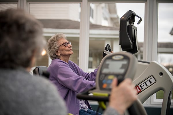 Residents engaging in exercise activities indoors