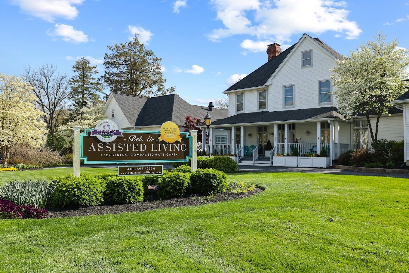 Exterior view of Bel Air Assisted Living facility with sign