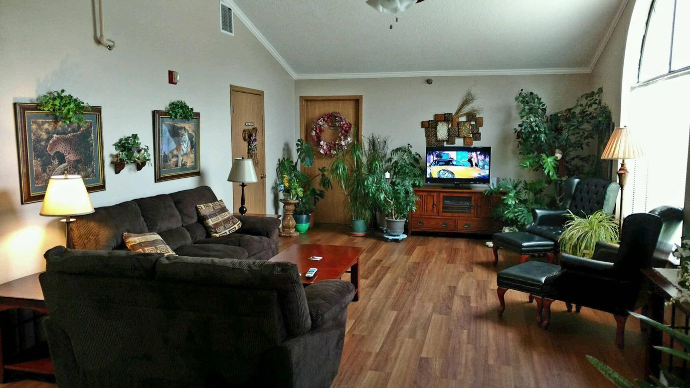 Cozy common area with plants and seating