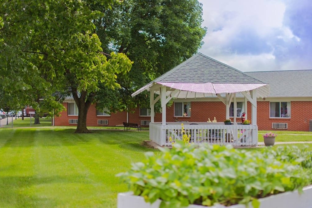 Outdoor gazebo in a well-maintained garden area