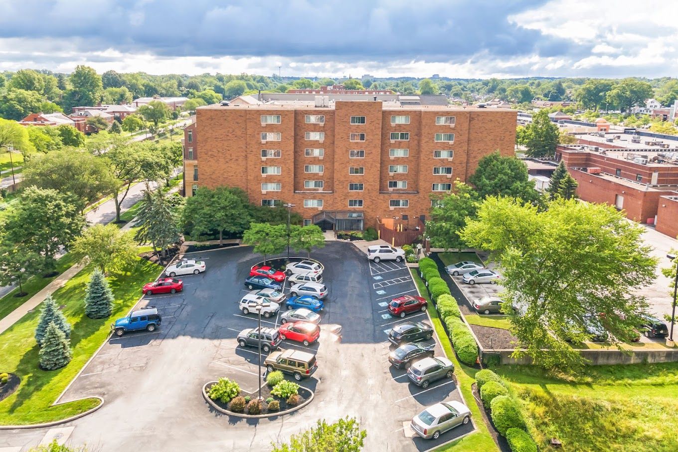 Aerial view of Campbell Court Senior Apartments with parking lot