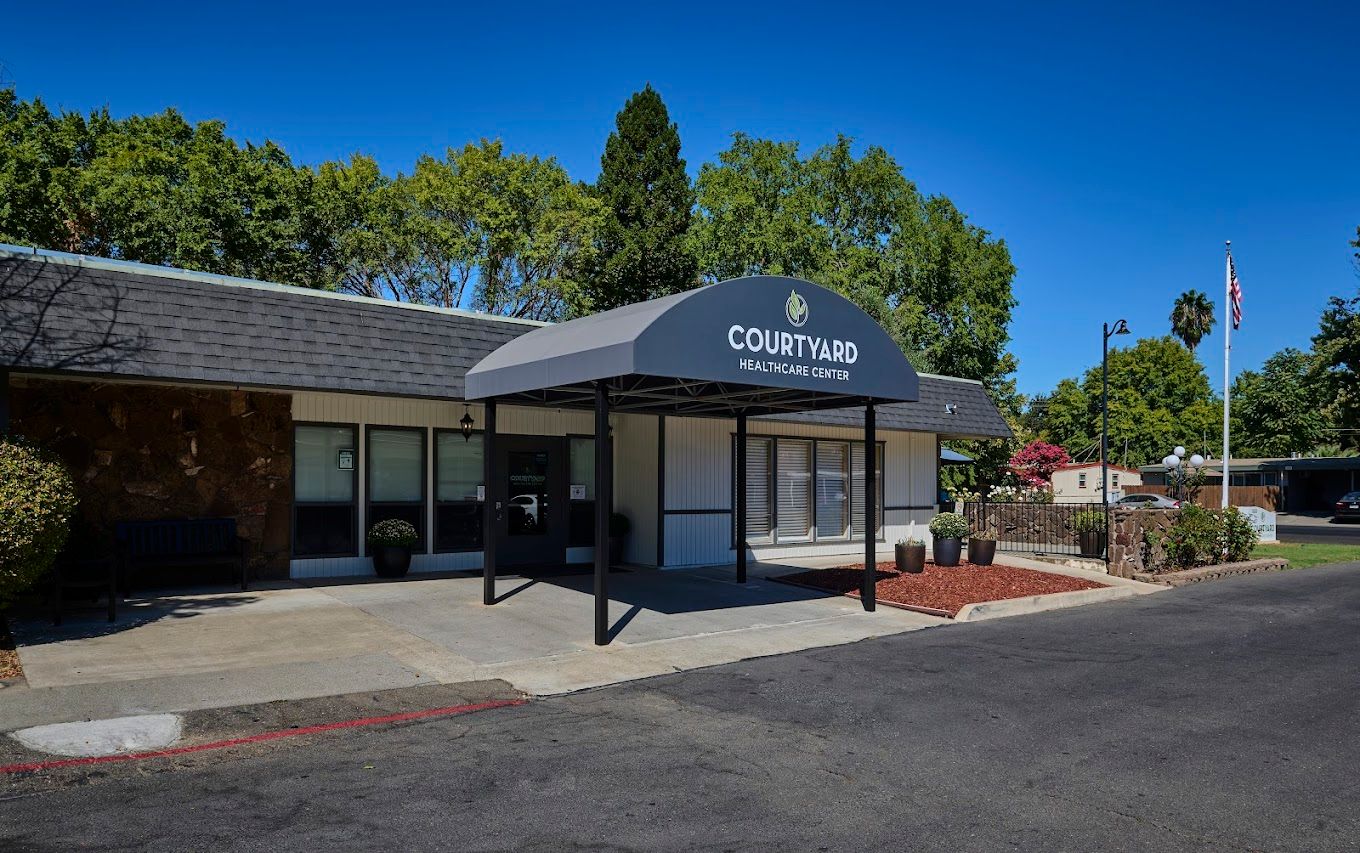 Exterior view of Courtyard Healthcare Center entrance