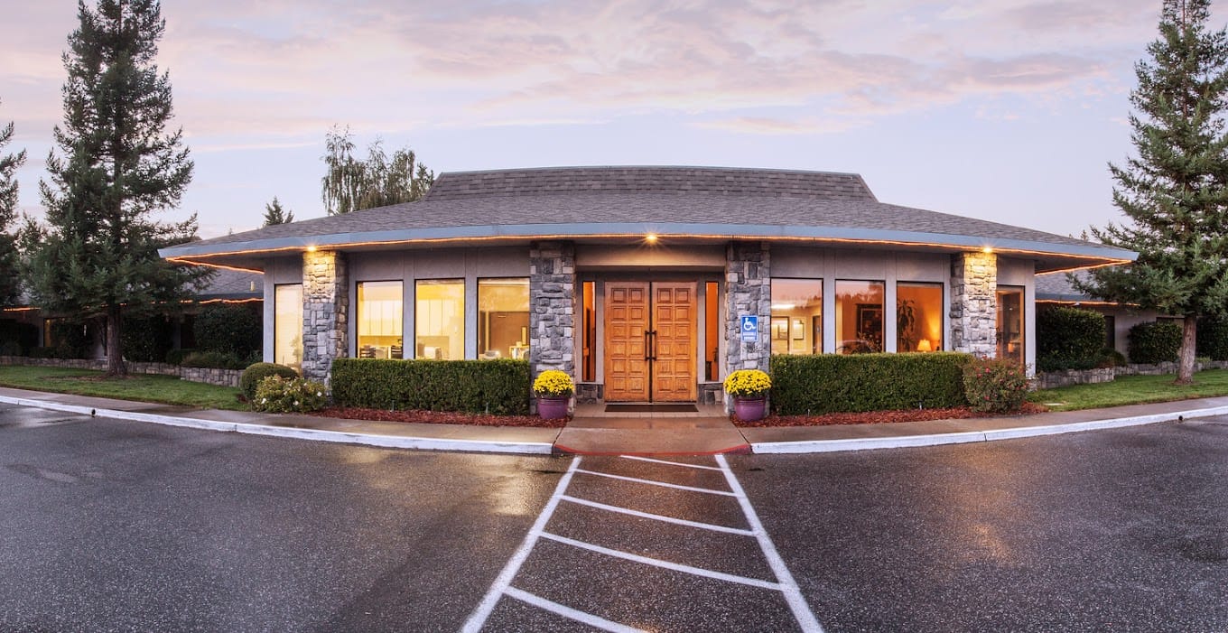 Exterior view of Crystal Ridge Care Center with landscaping