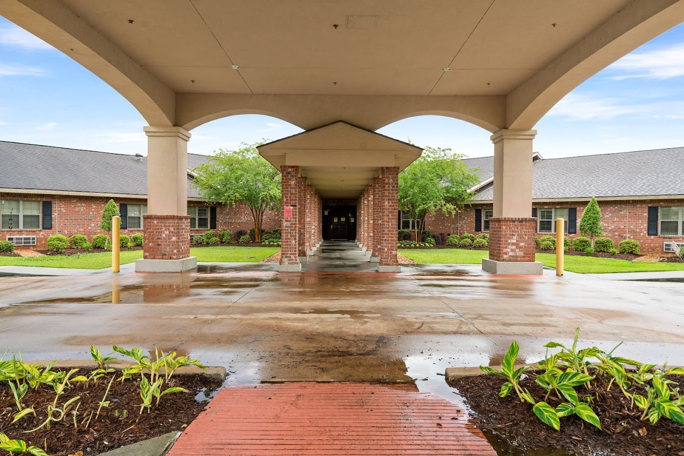 Entrance of a nursing home with a covered walkway