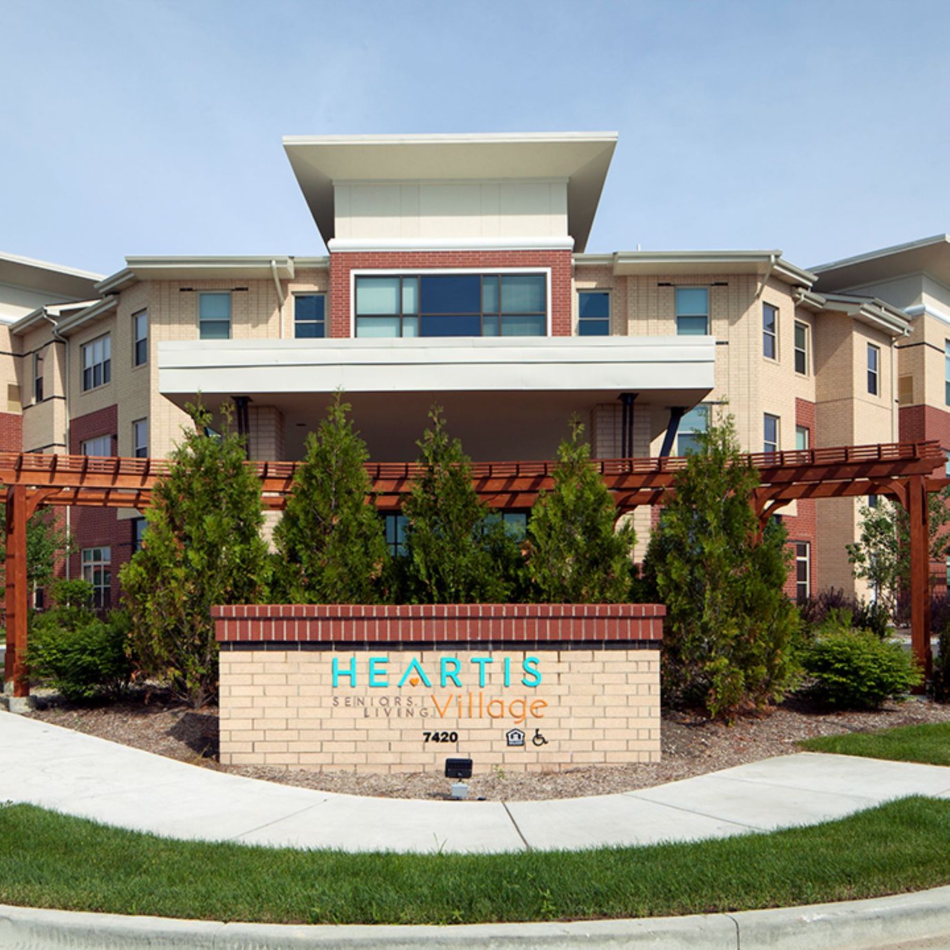 Exterior view of Heartis Village building entrance