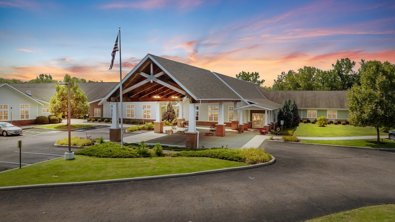 Exterior view of Hudson Springs Nursing & Rehab at sunset