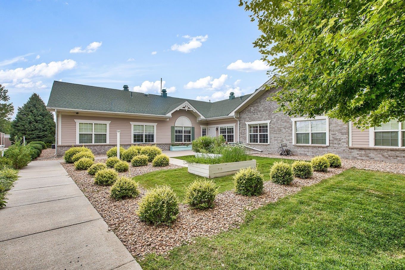 Exterior view of Juniper Village with landscaped garden