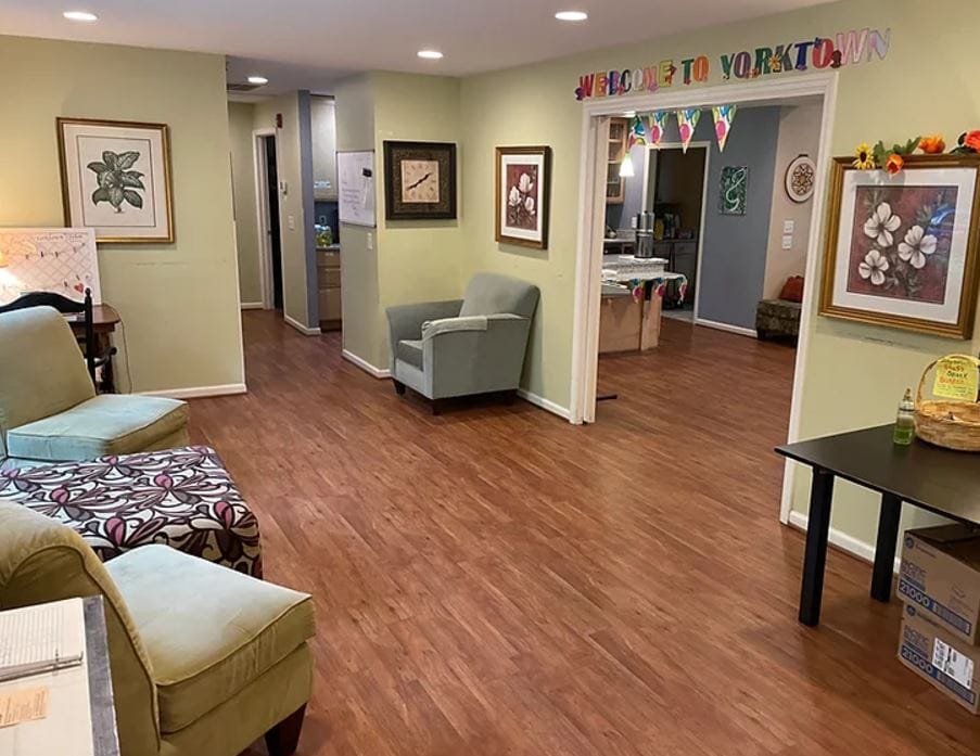 Bright common area with seating and decorations