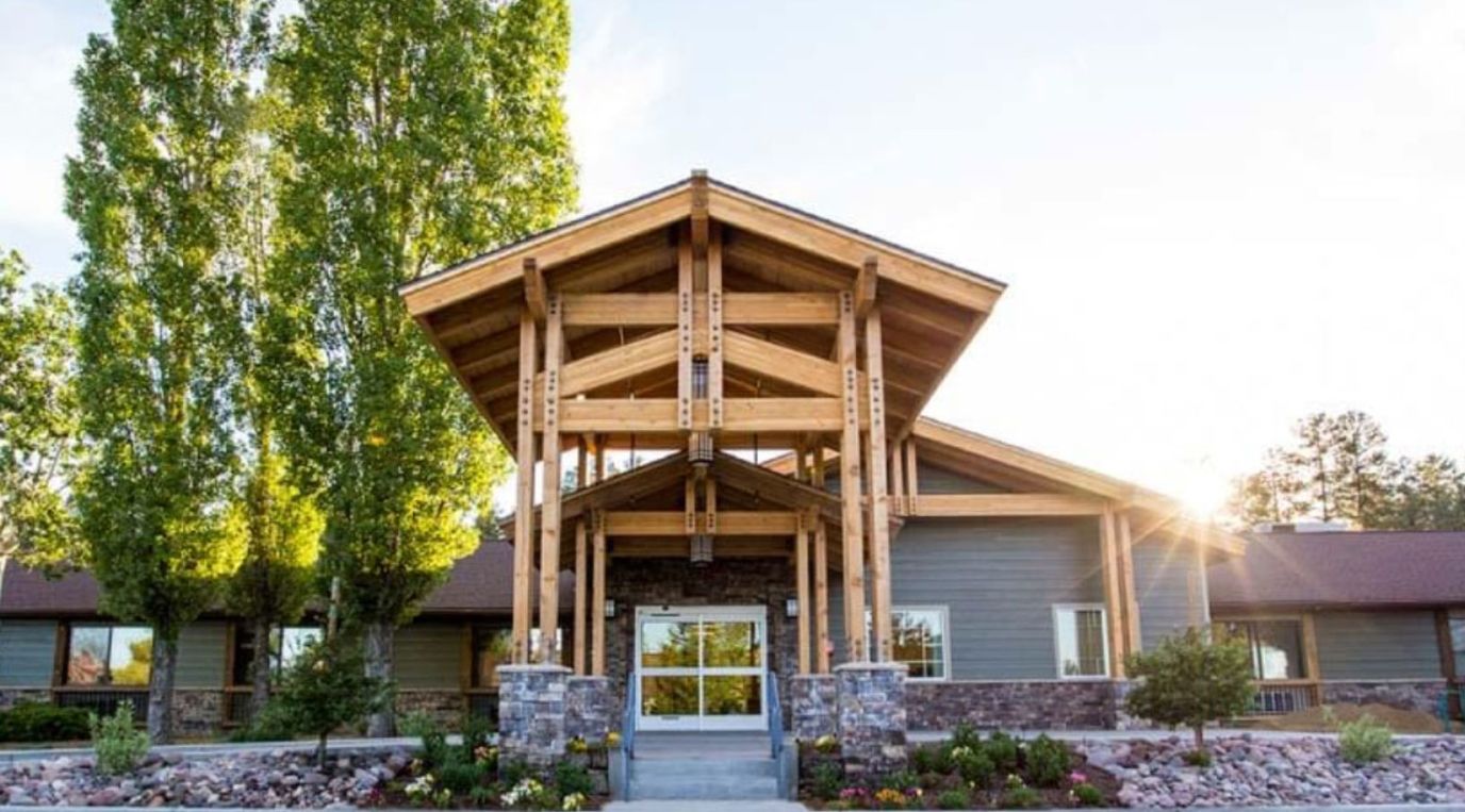 Exterior view of a senior living facility with a welcoming entrance