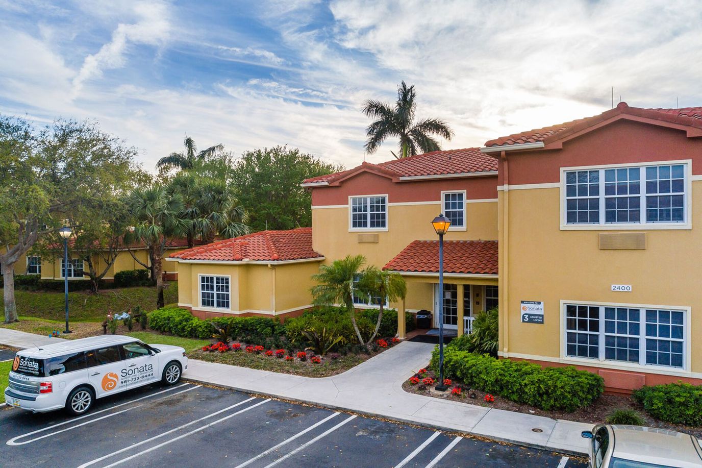 Exterior view of Sonata Boynton Beach with a parking area