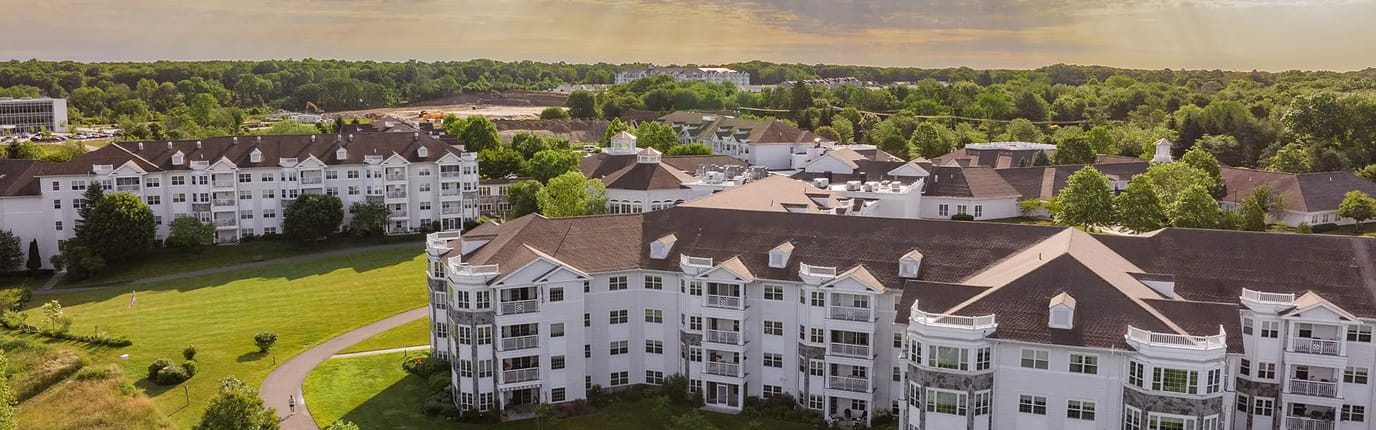Aerial view of StoneRidge Senior Living campus with greenery