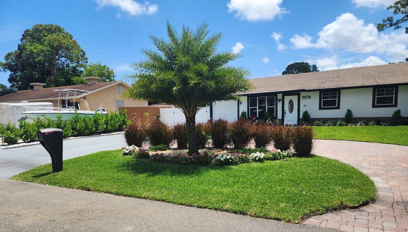 Well-maintained outdoor space with landscaping and greenery