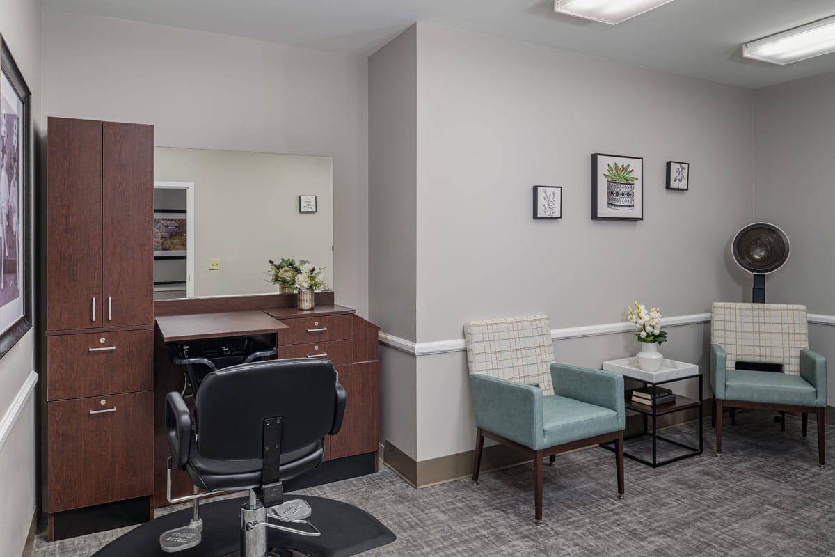 Hair salon area with chairs and mirrors