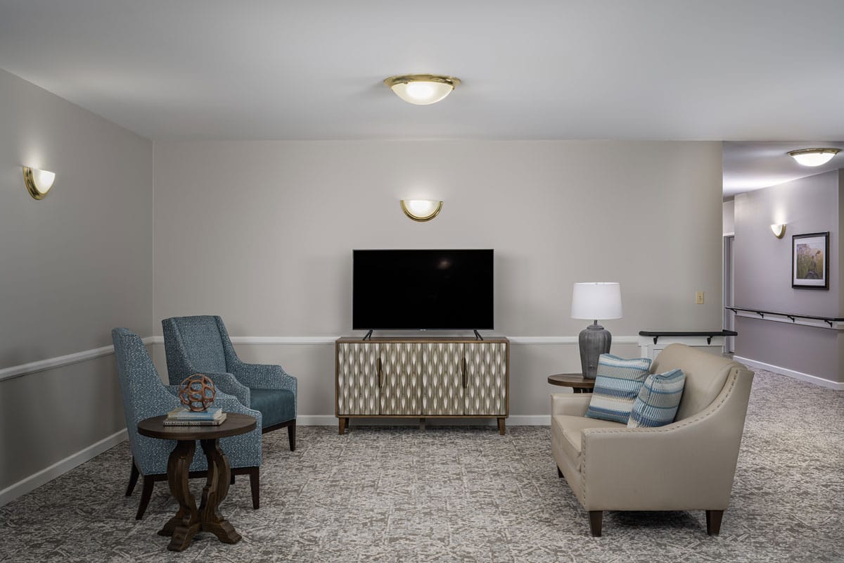 Interior common area with seating and television
