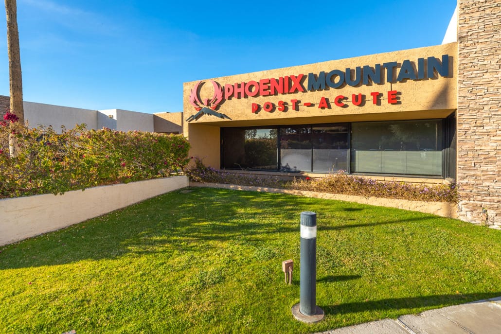 Exterior view of the Phoenix Mountain Post-Acute facility sign