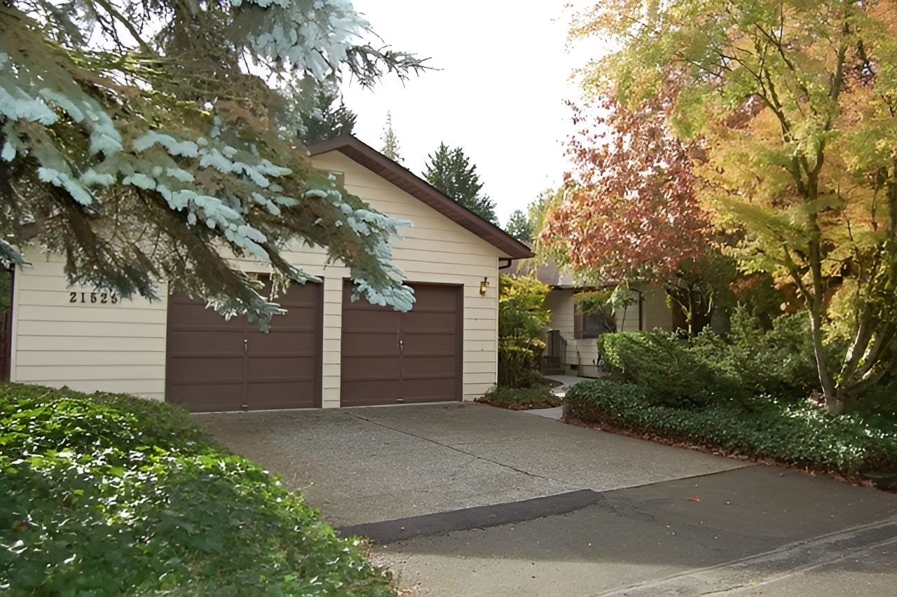 Exterior view of a care home with landscaping