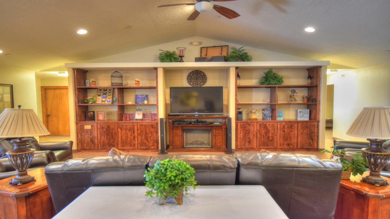 Cozy common area with seating and shelves