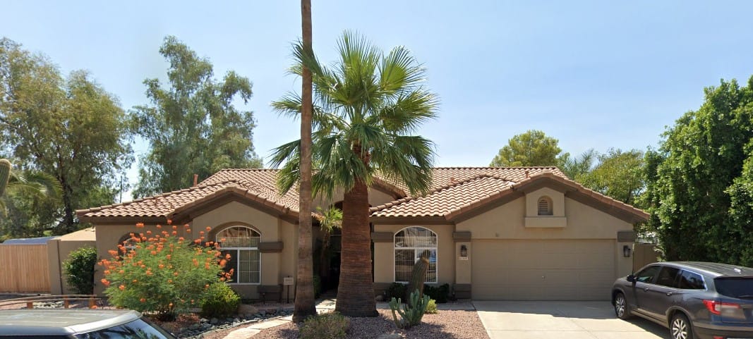 Exterior view of a residential facility with landscaping