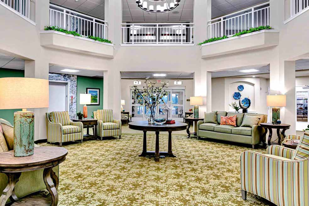Bright interior lounge area with seating and decor