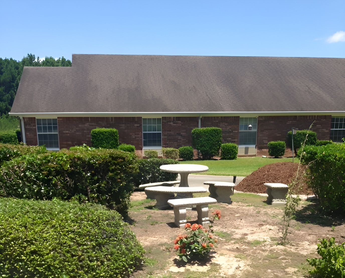 Outdoor seating area with a building backdrop