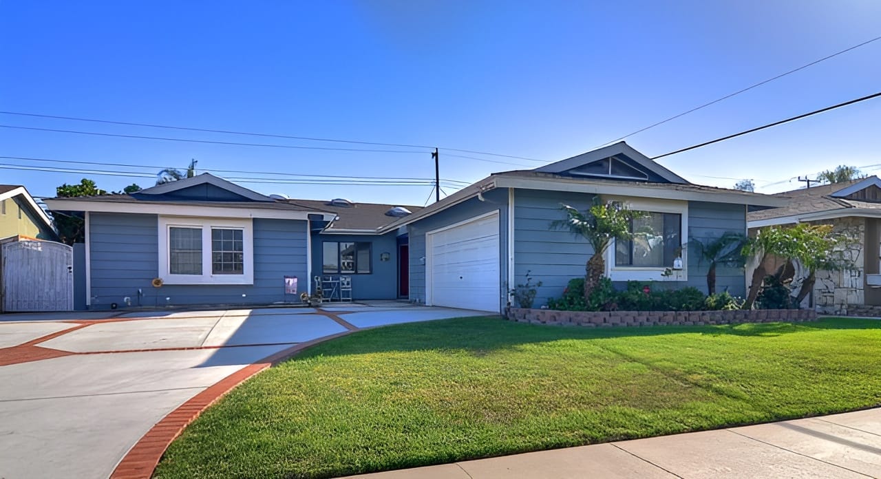 Exterior view of a residential style building with garden