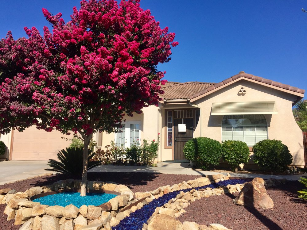 Exterior view of a residential care facility with landscaping
