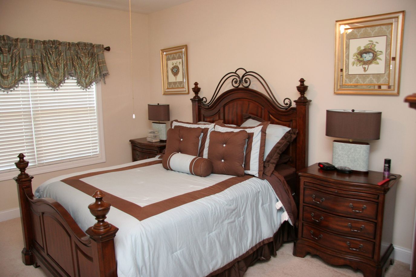 Cozy bedroom with wooden furniture and decorative accents