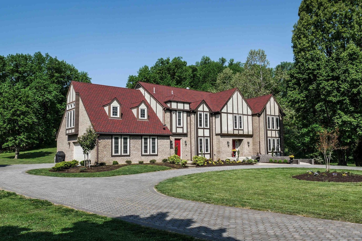 Exterior view of a senior living facility with landscaped grounds