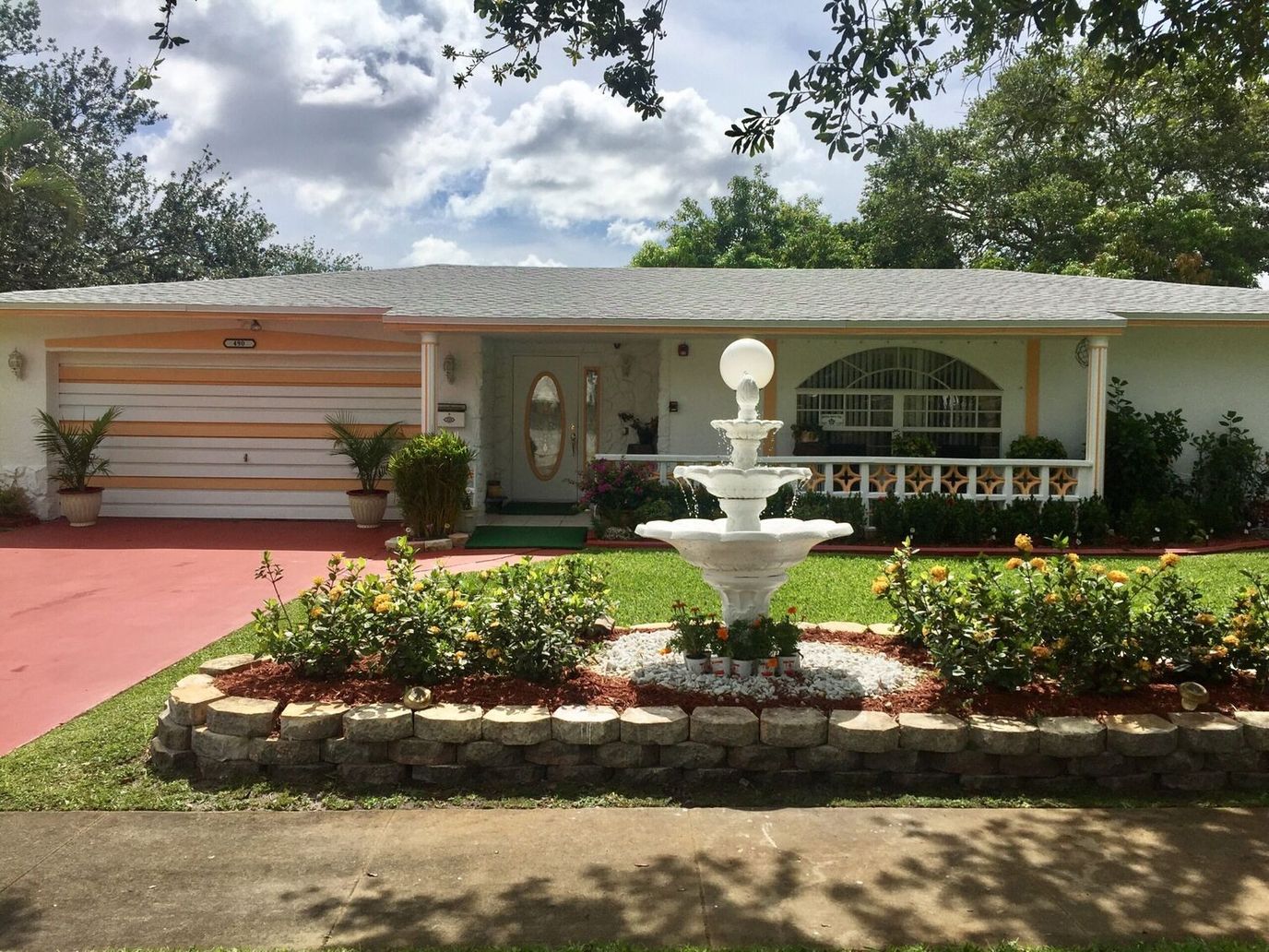 Exterior view of a residential building with garden
