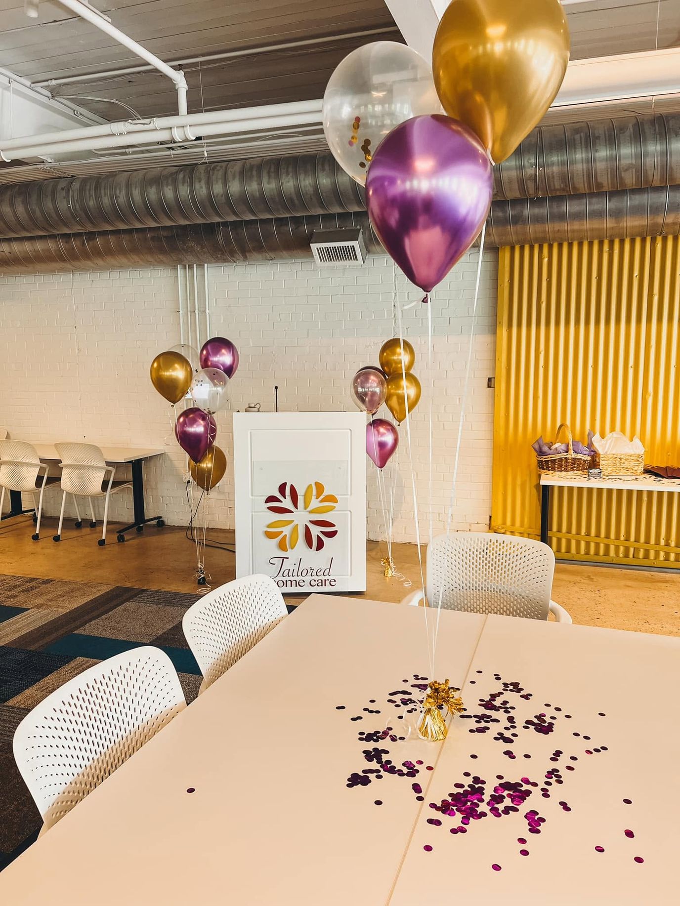 Birthday celebration setup with colorful balloons and decorations
